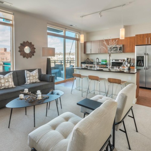 Generous living spaces to relax and unwind open concept apartment interior with large windows