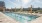 Rooftop pool with city views and outdoor seating