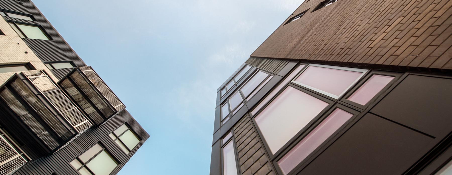 a low angle view looking up at The North End apartment buildings