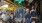 people sitting at tables and eating and walking on outside sidewalk
