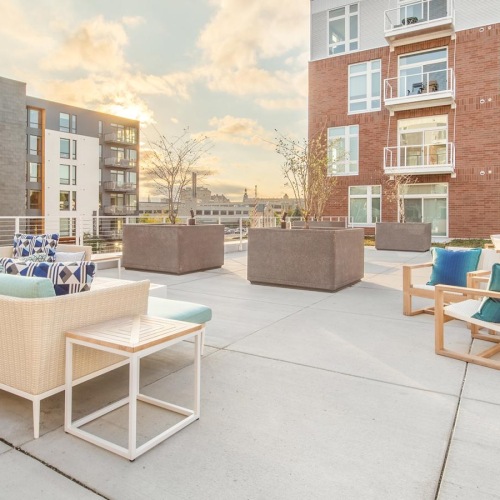 Access to resident-only features large, outdoor patio with a couch and chairs